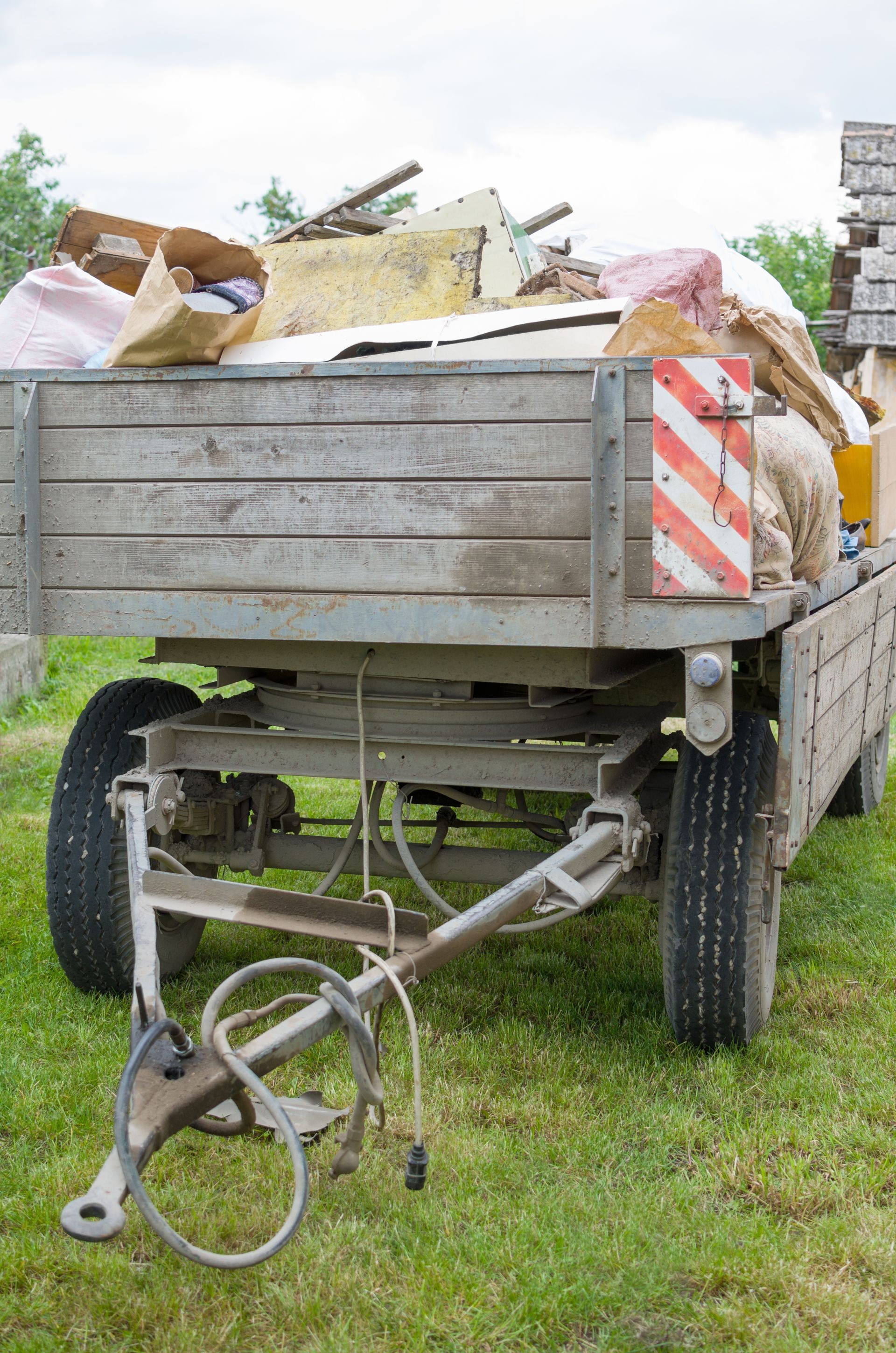 House Clearance Trailer in the Backyard Full of Junk
